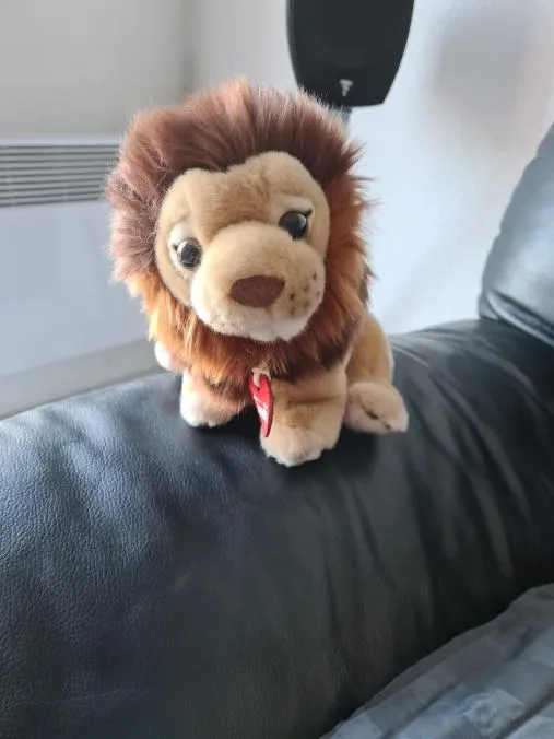 Trudi Lion Narciso peluche exotique 27 cm taille M