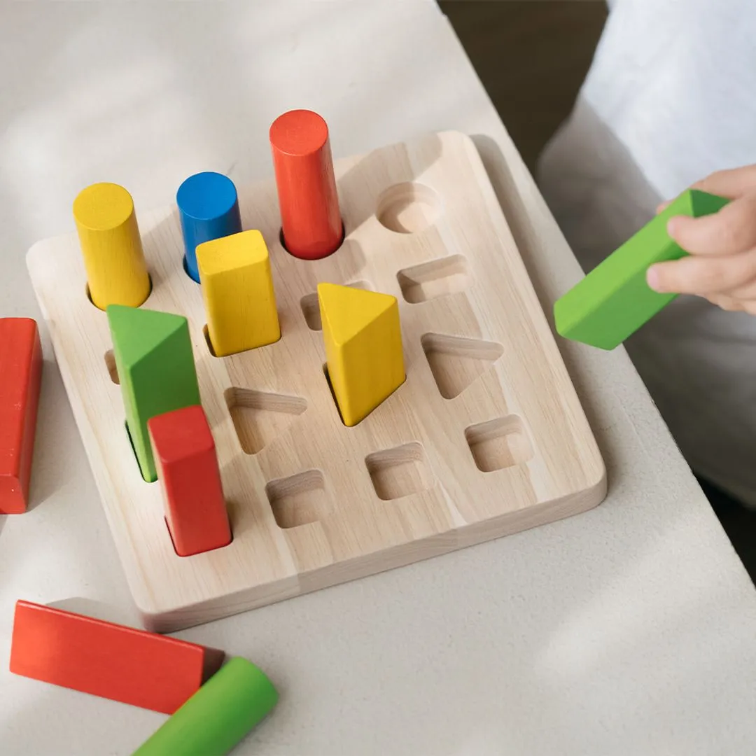 PlanToys Peg Board tableau chevilles géométrique