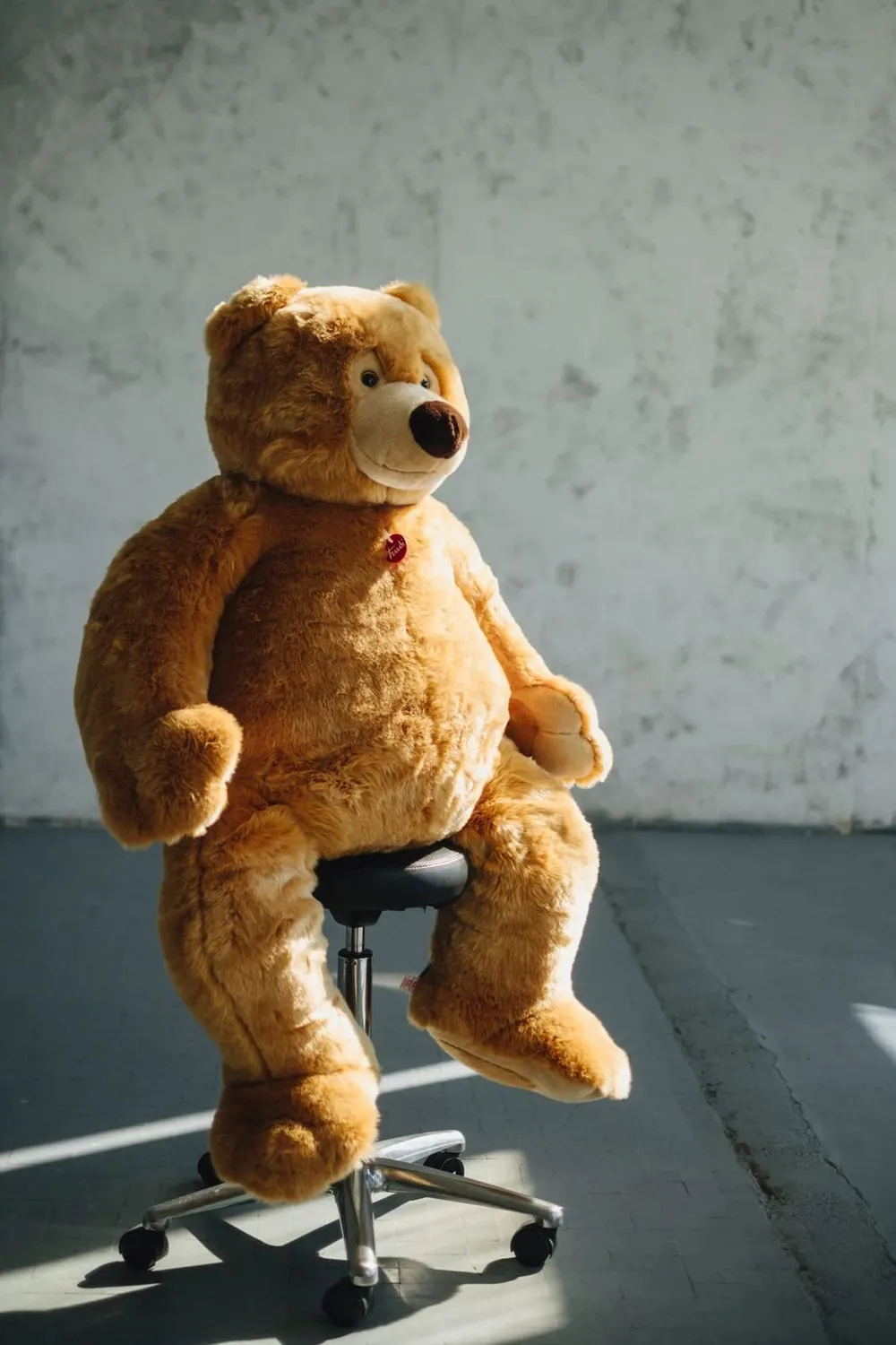 Trudi Ettore ours peluche poils longs regard tendre