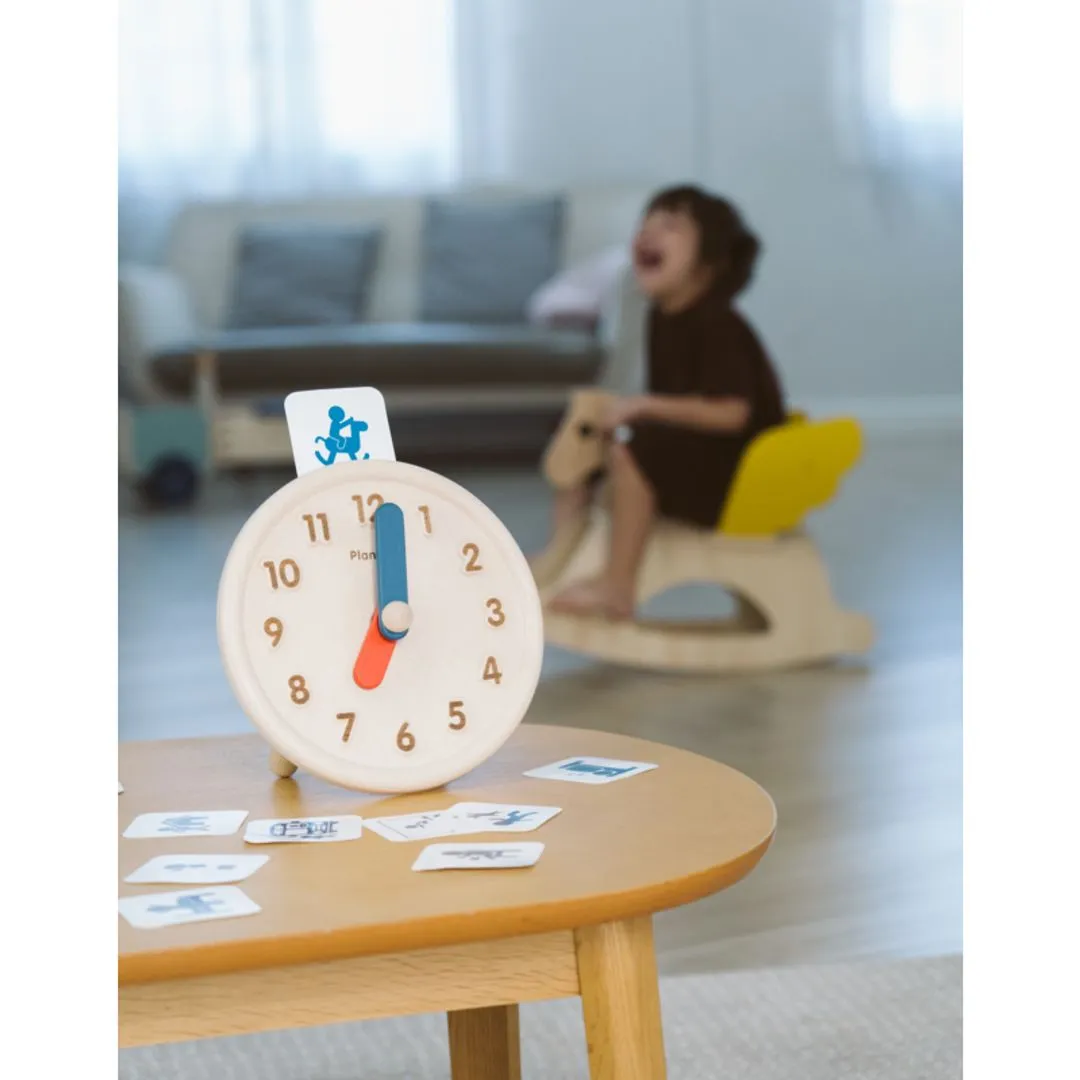 PlanToys Activity Clock horloge éducative bois 3 ans