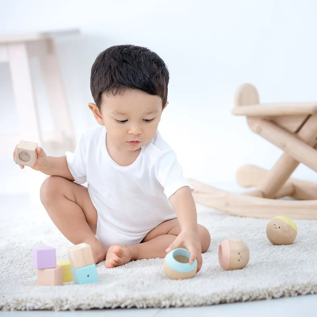 PlanToys Sensory Tumbling culbutos pastel 6 mois