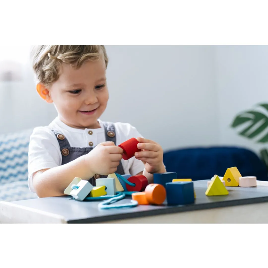 PlanToys Geo Lacing Beads perles à lacer bois 15 perles