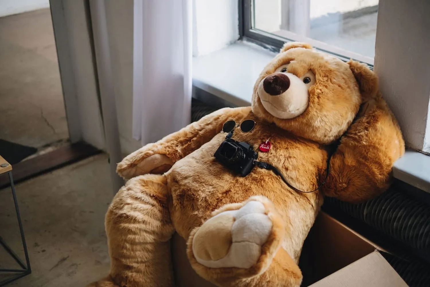 Trudi Ettore ours peluche poils longs regard tendre