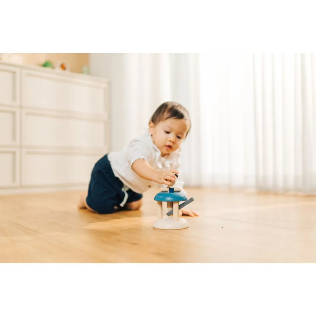 PlanToys Jumping Gymnast jouet pression bois bébé