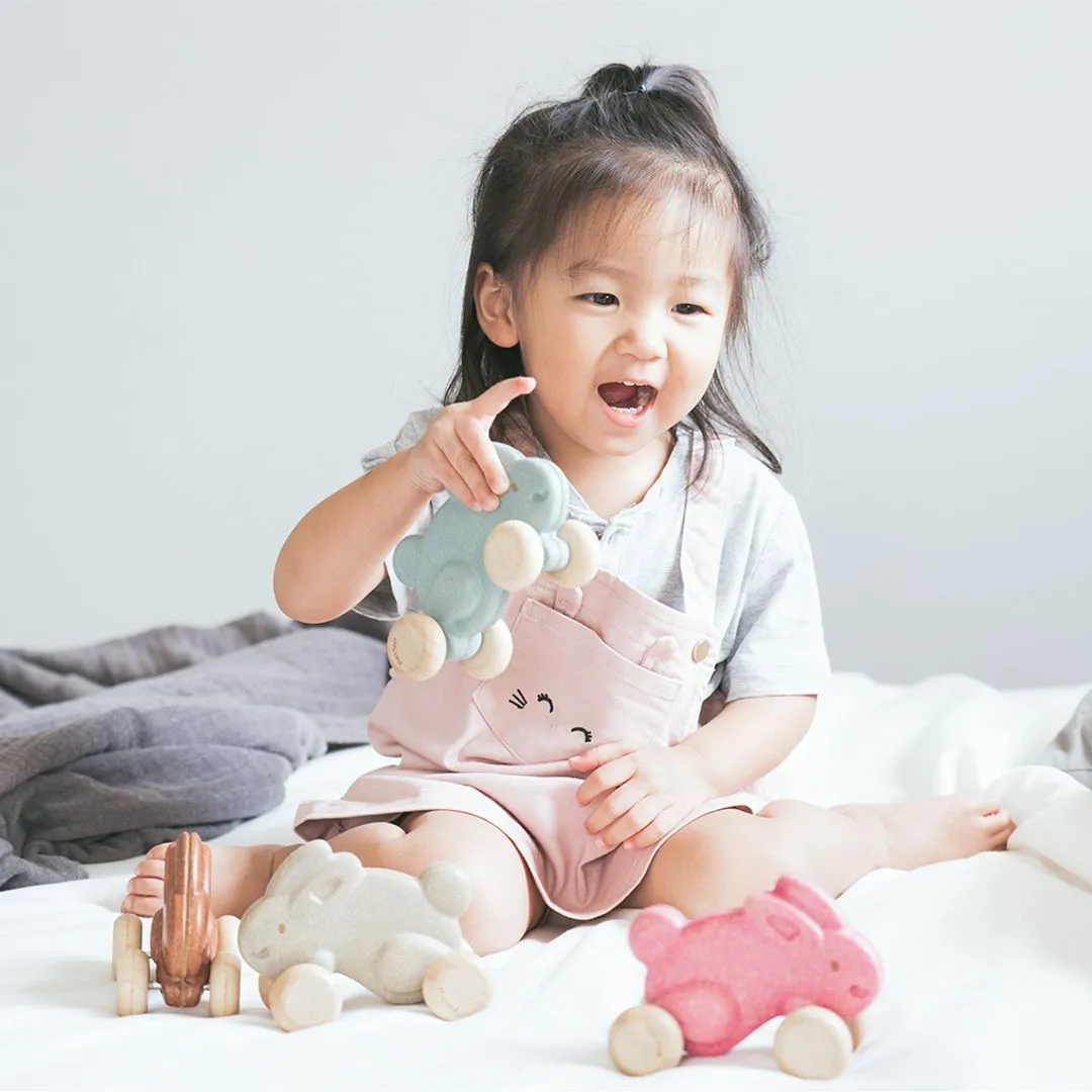PlanToys Lapin Jouet à pousser rose bois dès 12 mois