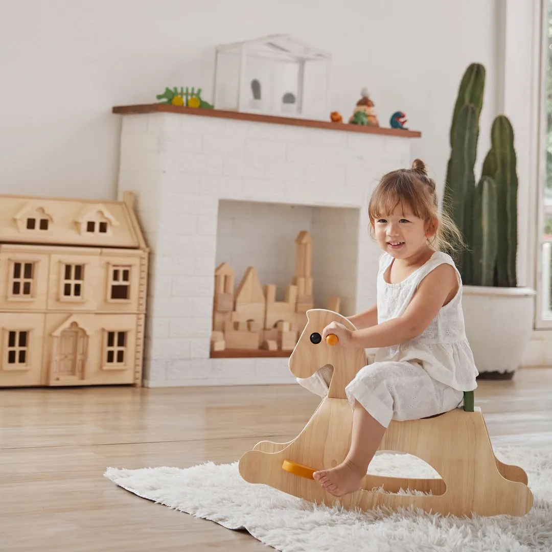 PlanToys Palomino cheval à bascule rouille bois