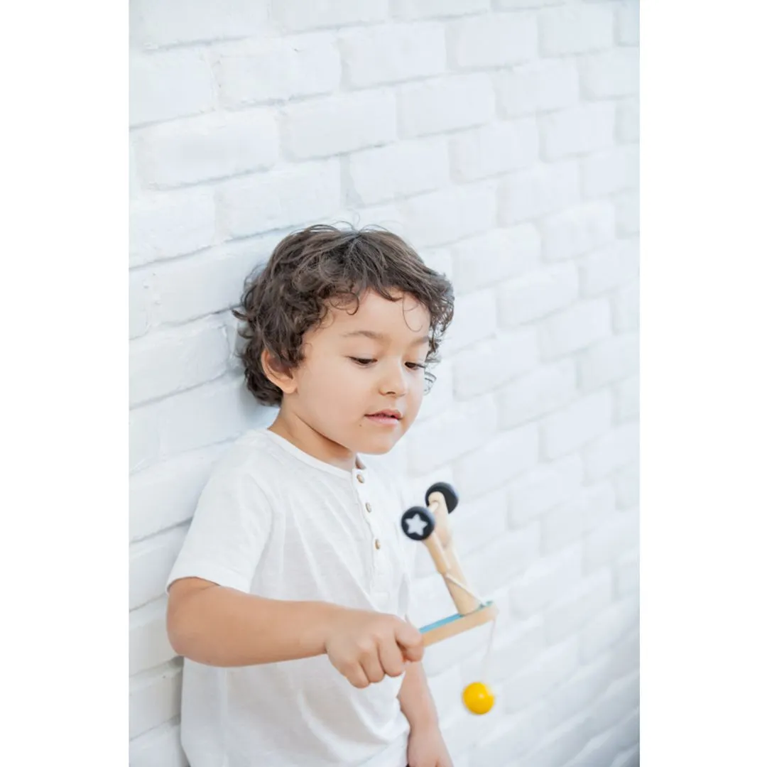 PlanToys Weightlifting Acrobat pendule acrobate bois
