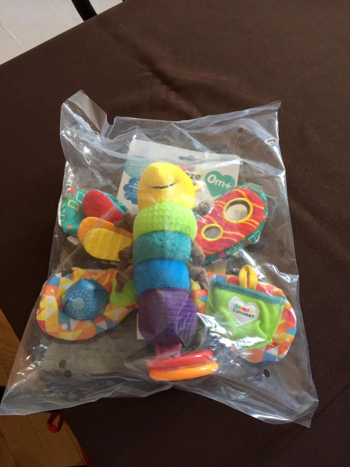 Tomy Lamaze Flip Flap Dragon peluche éveil naissance