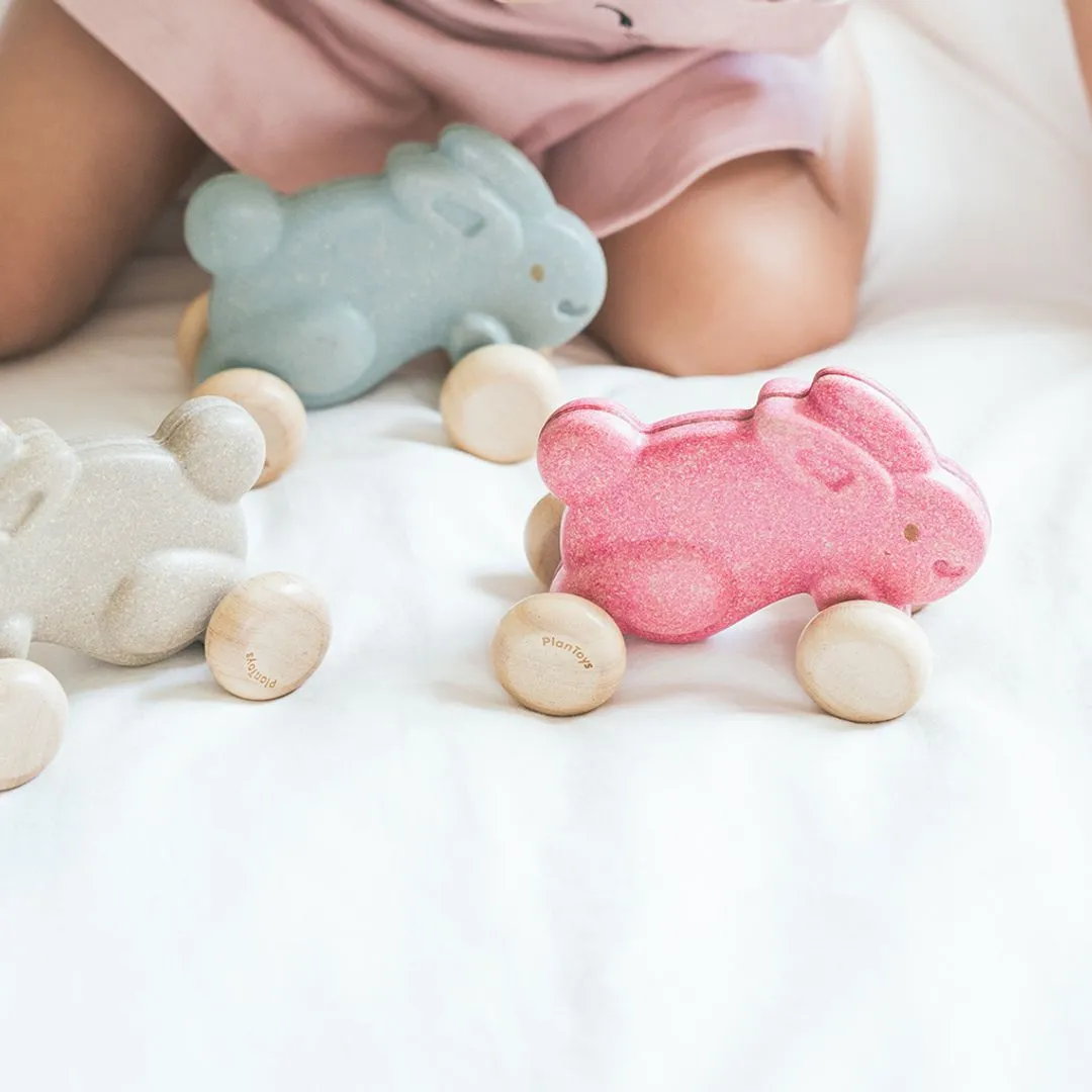 PlanToys Lapin Jouet à pousser rose bois dès 12 mois